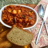 Harissa Chicken & Eggplant Stew served with a slab of homemade Bread